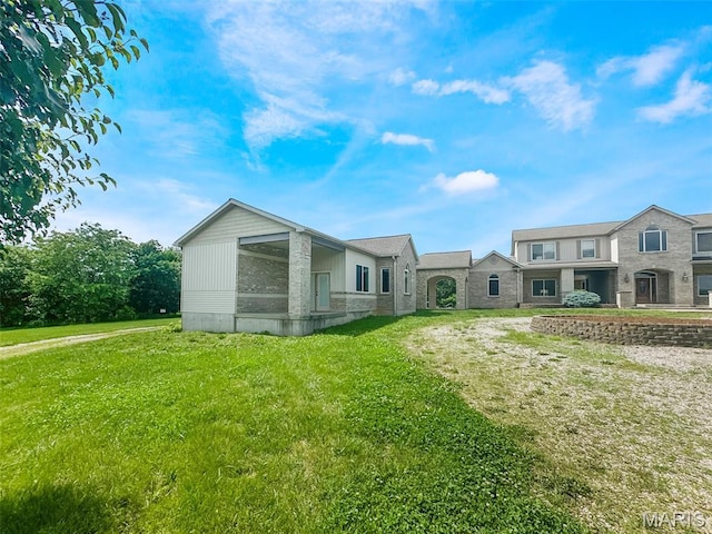 7203 Jakes Pr, Sullivan, MO 63080 - rear view of house with a yard
