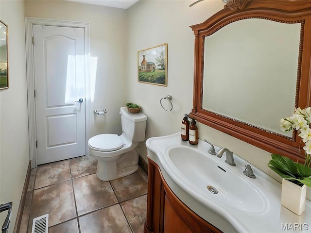 7203 Jakes Pr, Sullivan, MO 63080 - bathroom with vanity, toilet, and tile patterned flooring