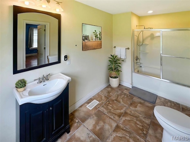 7203 Jakes Pr, Sullivan, MO 63080 - bathroom with baseboards, vanity, toilet, and bath / shower combo with glass door
