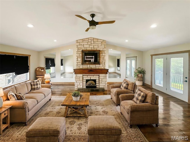 7203 Jakes Pr, Sullivan, MO 63080 - living area featuring ceiling fan, wood finished floors, a stone fireplace, vaulted ceiling, and recessed lighting