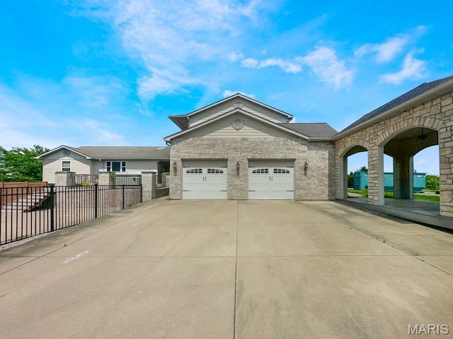 7203 Jakes Pr, Sullivan, MO 63080 - view of front of house featuring driveway, a garage, and brick siding