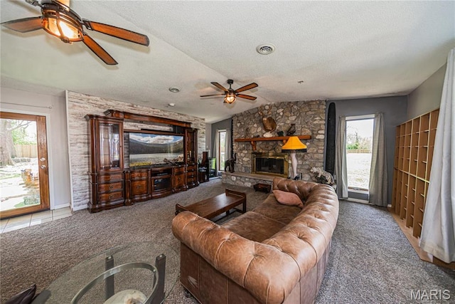 708 E Candy Cane Ln, West Frankfort, IL 62896 - living area featuring a ceiling fan, healthy amount of natural light, carpet floors, vaulted ceiling, and a textured ceiling