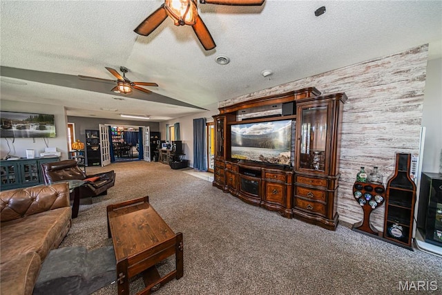 708 E Candy Cane Ln, West Frankfort, IL 62896 - living area with ceiling fan, carpet, and a textured ceiling
