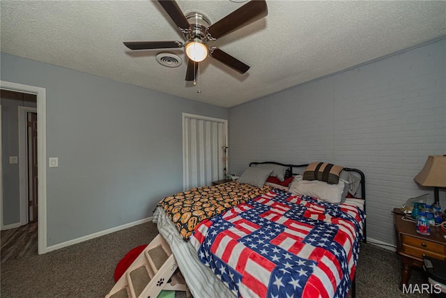 708 E Candy Cane Ln, West Frankfort, IL 62896 - carpeted bedroom with a textured ceiling and ceiling fan
