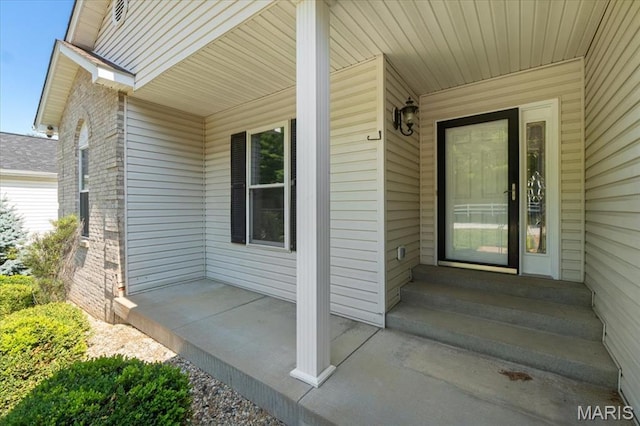 13374 Wintergreen Estates Dr, Fenton, MO 63026 - view of exterior entry featuring covered porch