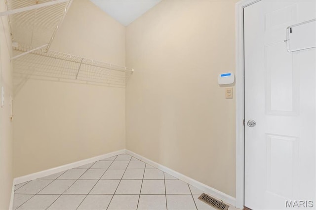 13374 Wintergreen Estates Dr, Fenton, MO 63026 - walk in closet featuring light tile patterned floors