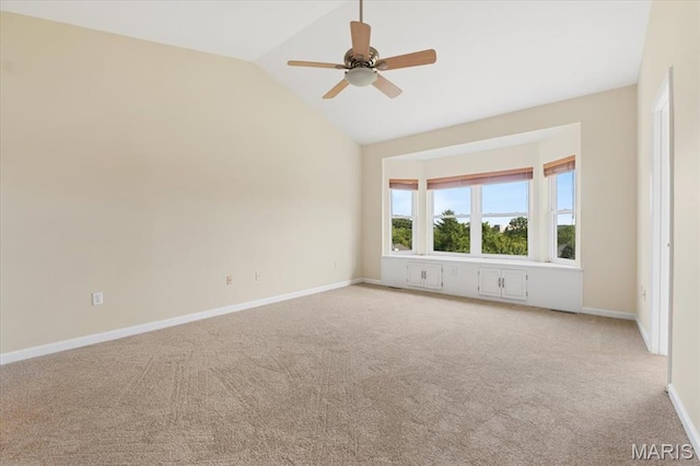 13374 Wintergreen Estates Dr, Fenton, MO 63026 - carpeted empty room featuring vaulted ceiling and ceiling fan