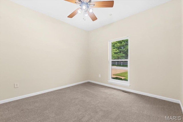 13374 Wintergreen Estates Dr, Fenton, MO 63026 - carpeted spare room featuring baseboards and ceiling fan