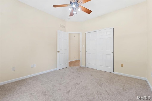 13374 Wintergreen Estates Dr, Fenton, MO 63026 - unfurnished bedroom featuring carpet, a closet, and ceiling fan