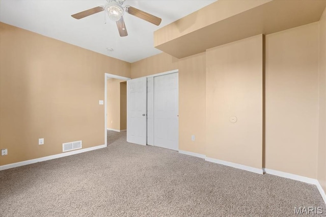 13374 Wintergreen Estates Dr, Fenton, MO 63026 - unfurnished bedroom with carpet flooring, ceiling fan, and a closet