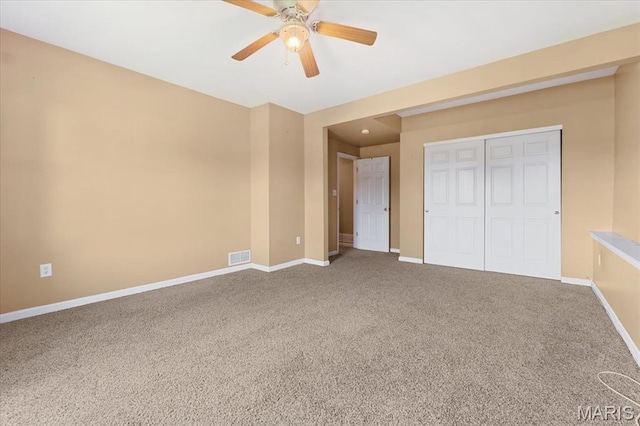 13374 Wintergreen Estates Dr, Fenton, MO 63026 - unfurnished bedroom with carpet floors, a closet, and a ceiling fan