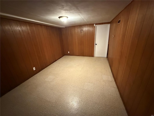 1418 Broadlawns Ln, Saint Louis, MO 63138 - unfurnished room featuring wooden walls
