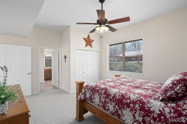 152 Geneva Cove Dr, Innsbrook, MO 63390 - carpeted bedroom featuring baseboards, a closet, ceiling fan, and connected bathroom