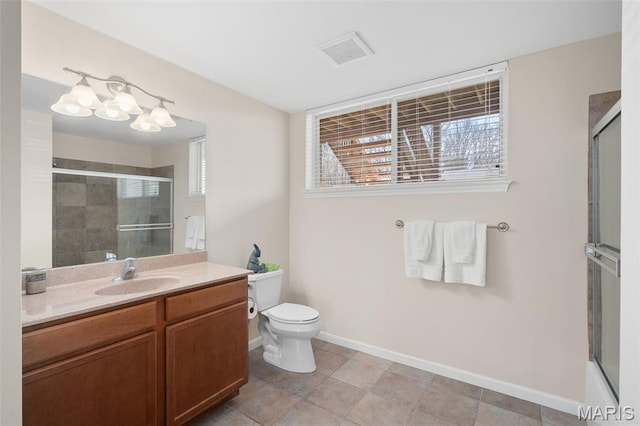 152 Geneva Cove Dr, Innsbrook, MO 63390 - bathroom featuring a tile shower, baseboards, vanity, and toilet