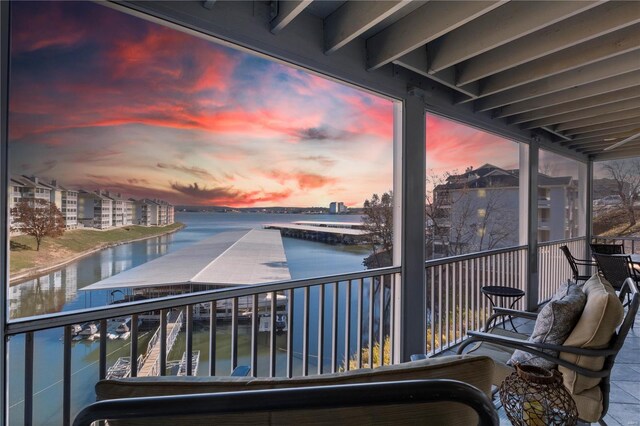 balcony at dusk with a water view