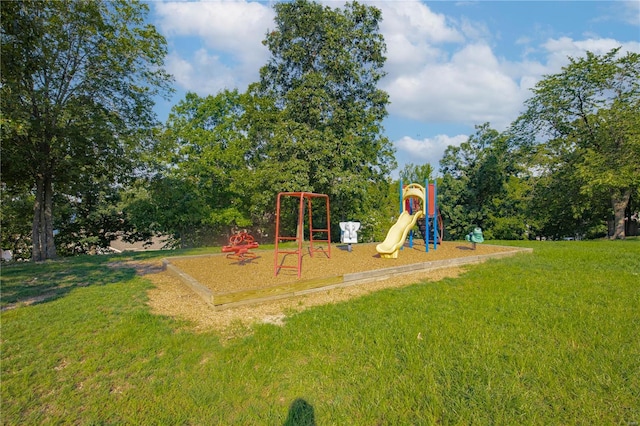 community playground featuring a yard