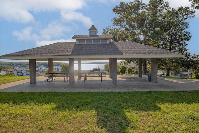 surrounding community featuring a gazebo and a lawn