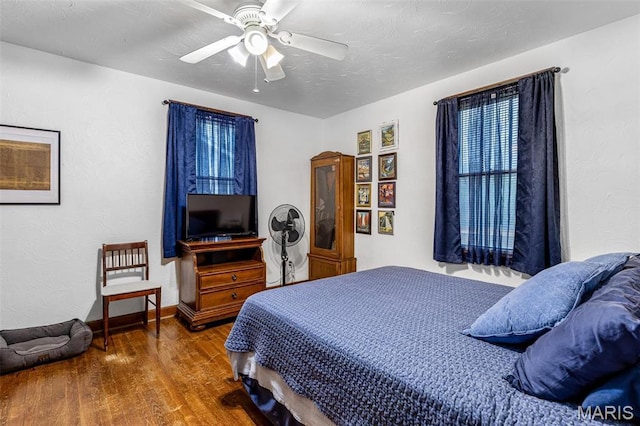 399 Roberts St, Saint Genevieve, MO 63670 - bedroom featuring wood finished floors, ceiling fan, and baseboards