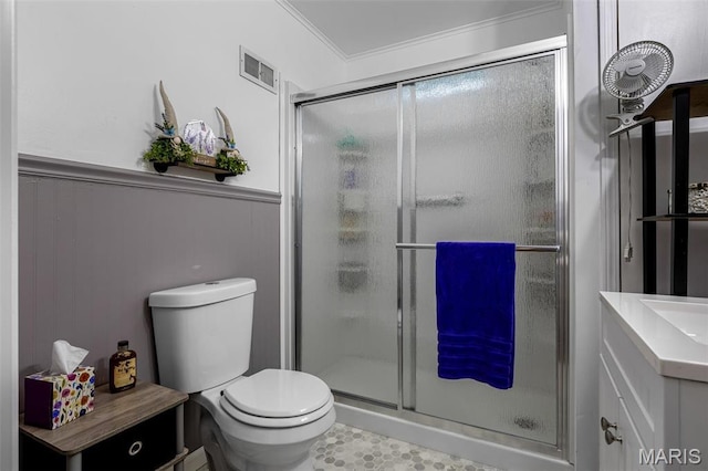 399 Roberts St, Saint Genevieve, MO 63670 - bathroom featuring a stall shower, a wainscoted wall, vanity, toilet, and ornamental molding