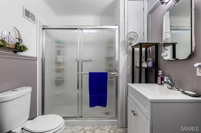 399 Roberts St, Saint Genevieve, MO 63670 - bathroom featuring a shower stall, toilet, vanity, and crown molding