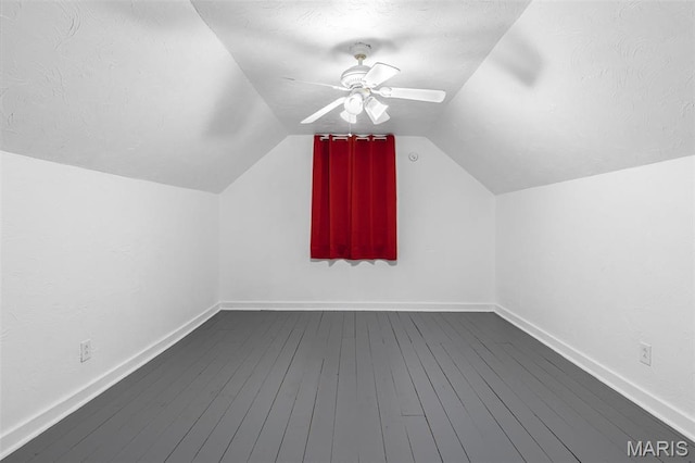 399 Roberts St, Saint Genevieve, MO 63670 - bonus room with dark wood-style flooring, vaulted ceiling, baseboards, and ceiling fan