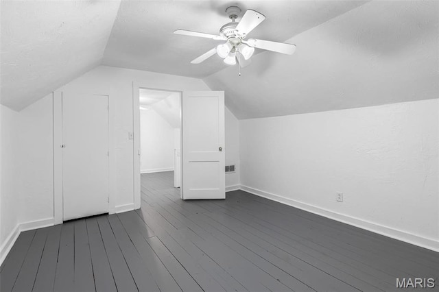 399 Roberts St, Saint Genevieve, MO 63670 - bonus room featuring lofted ceiling, dark wood finished floors, baseboards, and a ceiling fan