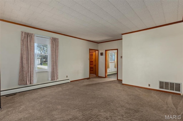 204 E 3rd N St, Mount Olive, IL 62069 - empty room featuring a baseboard heating unit, ornamental molding, carpet flooring, baseboards, and baseboard heating