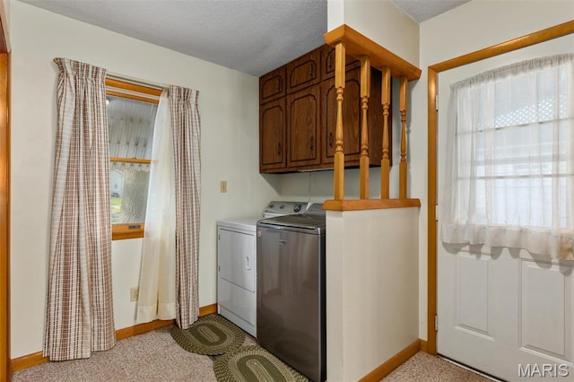 204 E 3rd N St, Mount Olive, IL 62069 - washroom featuring independent washer and dryer, plenty of natural light, baseboards, light carpet, and a textured ceiling
