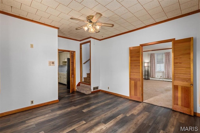 204 E 3rd N St, Mount Olive, IL 62069 - empty room with ornamental molding, a baseboard radiator, stairway, ceiling fan, and baseboards