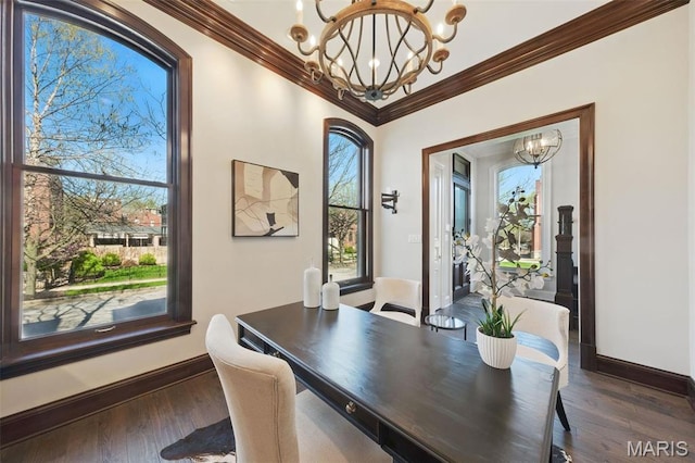 1212 Dolman St, Saint Louis, MO 63104 - dining area featuring a chandelier, ornamental molding, dark wood finished floors, and baseboards