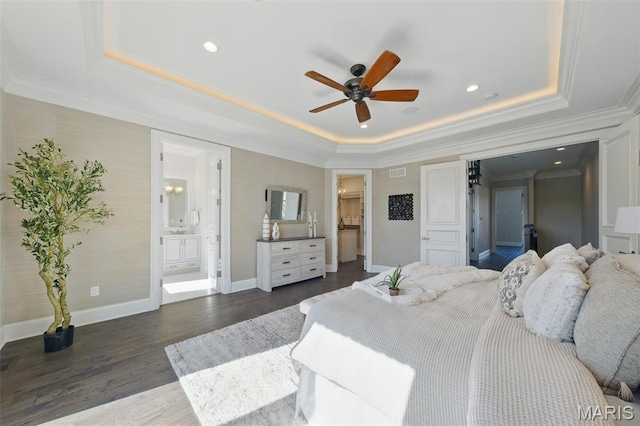 1212 Dolman St, Saint Louis, MO 63104 - bedroom with a tray ceiling, ornamental molding, ensuite bathroom, dark wood-style floors, and recessed lighting