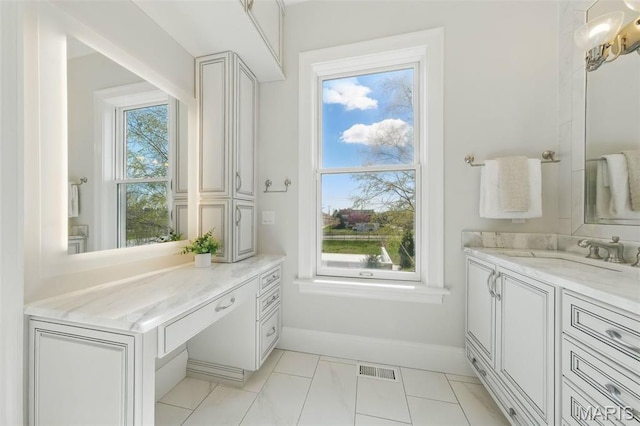 1212 Dolman St, Saint Louis, MO 63104 - bathroom with vanity and baseboards