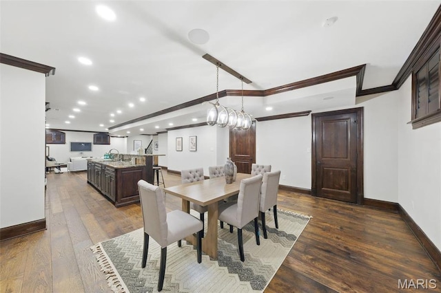 1212 Dolman St, Saint Louis, MO 63104 - dining room featuring recessed lighting, dark wood-type flooring, crown molding, and baseboards