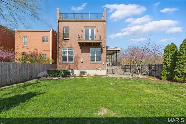 1212 Dolman St, Saint Louis, MO 63104 - back of property featuring a balcony and brick siding