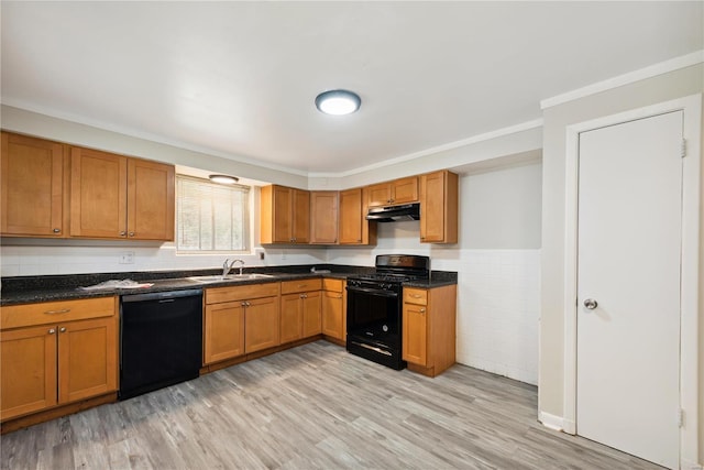 7921 Glenside Pl, Saint Louis, MO 63130 - kitchen featuring black appliances, under cabinet range hood, a sink, light wood-style flooring, and brown cabinetry