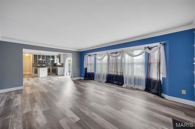 1008 Baypointe Dr, Imperial, MO 63052 - unfurnished living room with crown molding and wood finished floors