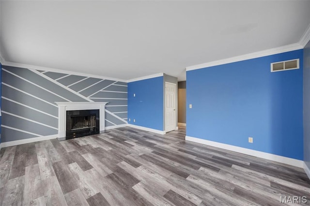 1008 Baypointe Dr, Imperial, MO 63052 - unfurnished living room with wood finished floors, a fireplace with flush hearth, and ornamental molding