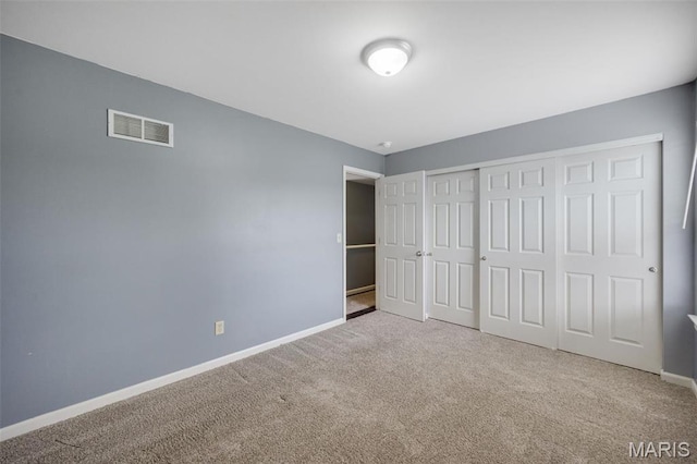 1008 Baypointe Dr, Imperial, MO 63052 - unfurnished bedroom featuring carpet and a closet