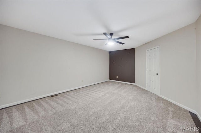 1008 Baypointe Dr, Imperial, MO 63052 - spare room with a ceiling fan and carpet flooring