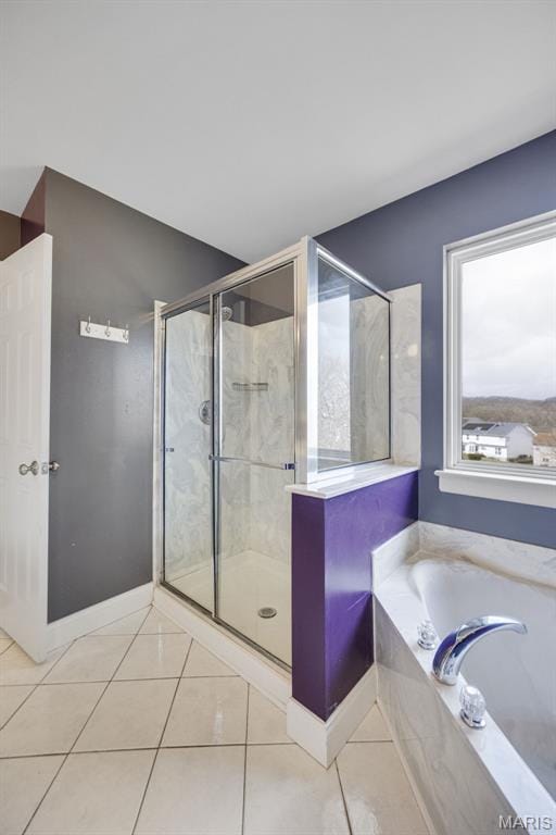1008 Baypointe Dr, Imperial, MO 63052 - full bathroom featuring a bath, tile patterned floors, and a shower stall