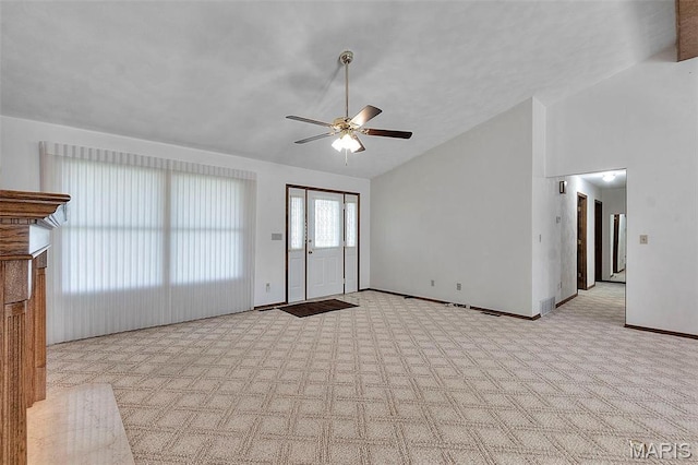413 Huber Rd, Perryville, MO 63775 - unfurnished living room with lofted ceiling, carpet, ceiling fan, and baseboards