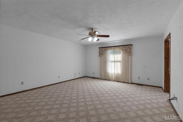413 Huber Rd, Perryville, MO 63775 - unfurnished room with ceiling fan, carpet floors, and baseboards