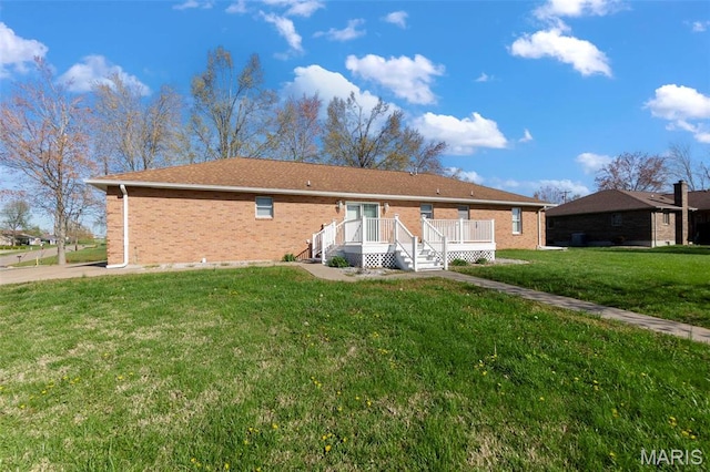 413 Huber Rd, Perryville, MO 63775 - back of property with brick siding, a yard, and a deck