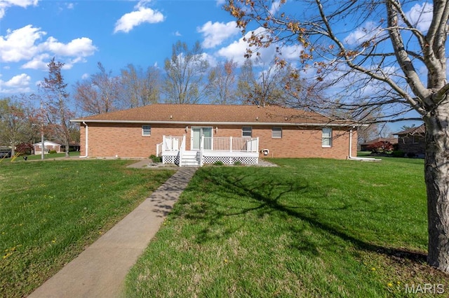 413 Huber Rd, Perryville, MO 63775 - rear view of property featuring brick siding, a yard, and a deck