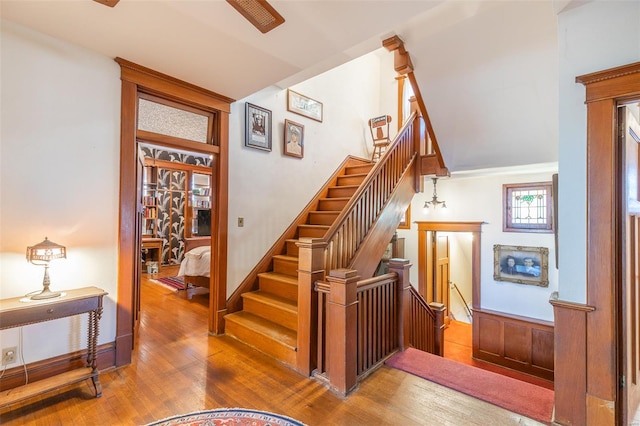 stairs with wood finished floors