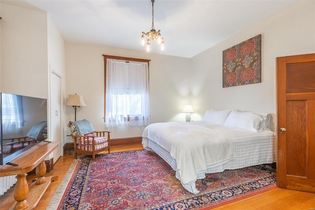 bedroom with light wood-style floors