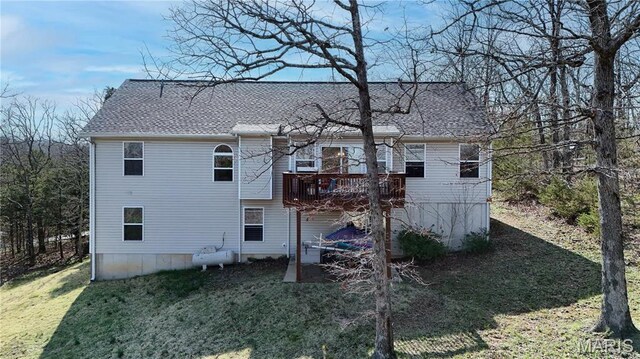 12 Sumter Dr, Hillsboro, MO 63050 - back of property with a shingled roof, a yard, and a wooden deck