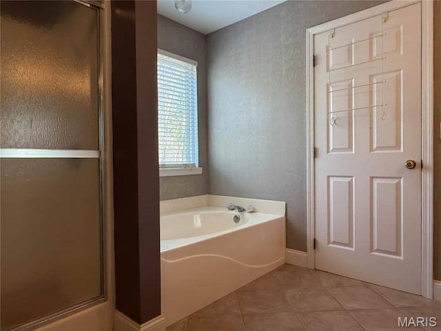 12 Sumter Dr, Hillsboro, MO 63050 - full bathroom featuring a stall shower, a garden tub, tile patterned flooring, baseboards, and a textured wall