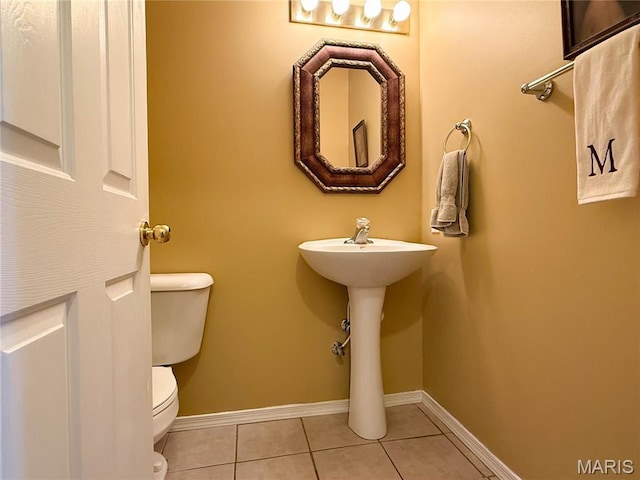 12 Sumter Dr, Hillsboro, MO 63050 - bathroom featuring toilet, tile patterned floors, and baseboards