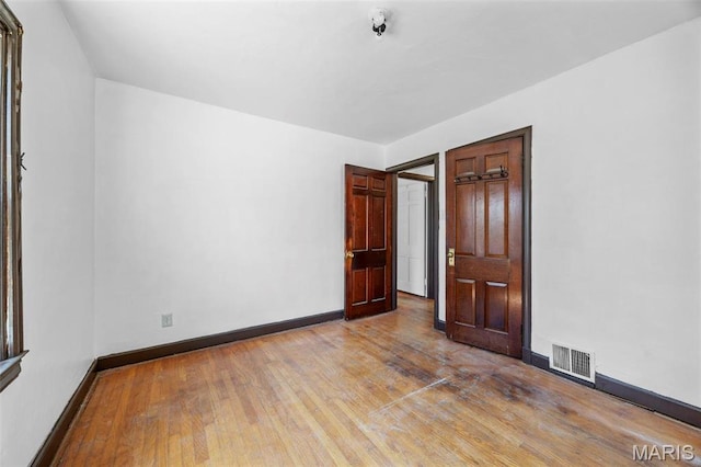 1825 S New Florissant Rd, Florissant, MO 63031 - empty room featuring baseboards and light wood-style flooring